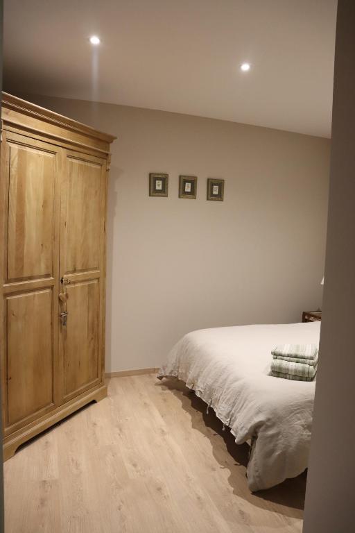 Postel nebo postele na pokoji v ubytování Gîte des Potiers