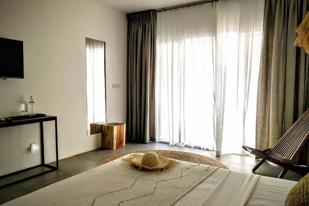Postel nebo postele na pokoji v ubytování Coco Villa