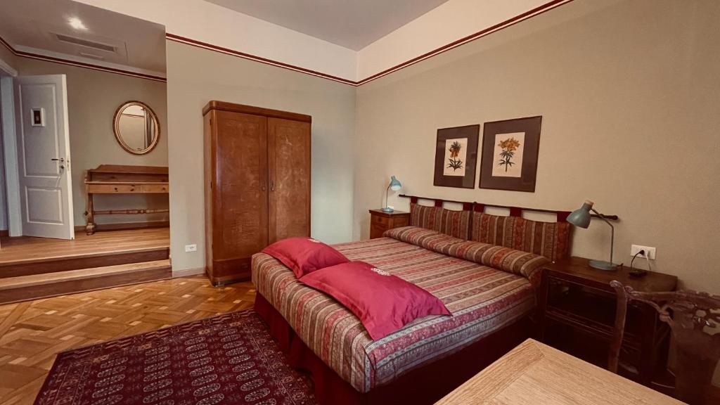 Postel nebo postele na pokoji v ubytování Residenza Le 6 A