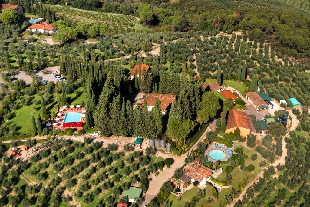 an aerial view of a house with trees at Agriturismo Vecchio Borgo Di Inalbi in Impruneta