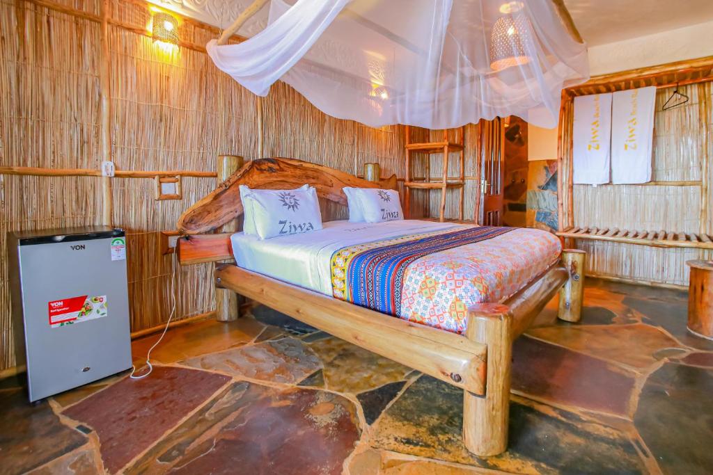 Postel nebo postele na pokoji v ubytování Ziwa Beach Resort