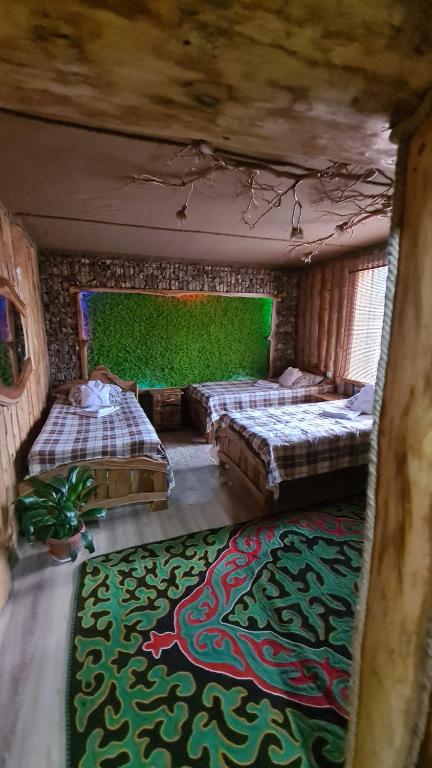 Postel nebo postele na pokoji v ubytování Кереге-Таш