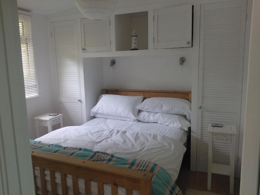 Postel nebo postele na pokoji v ubytování Whiteshell Chalets