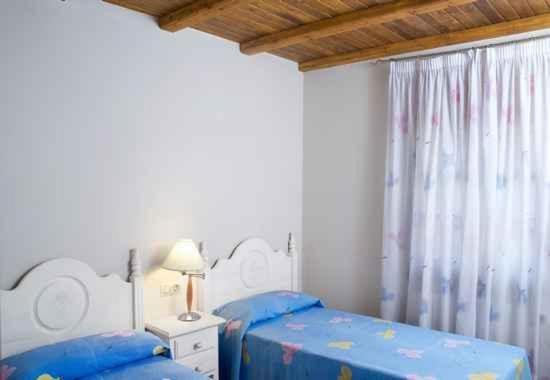 Postel nebo postele na pokoji v ubytování Can Garriga
