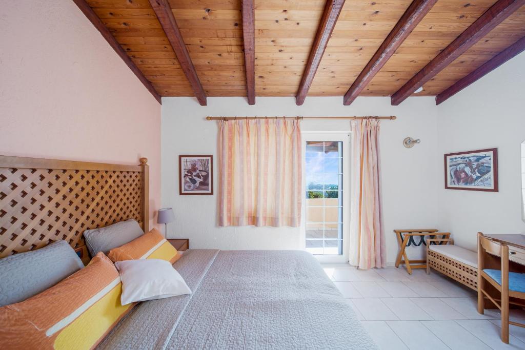 Postel nebo postele na pokoji v ubytování Sissi Hills Villa