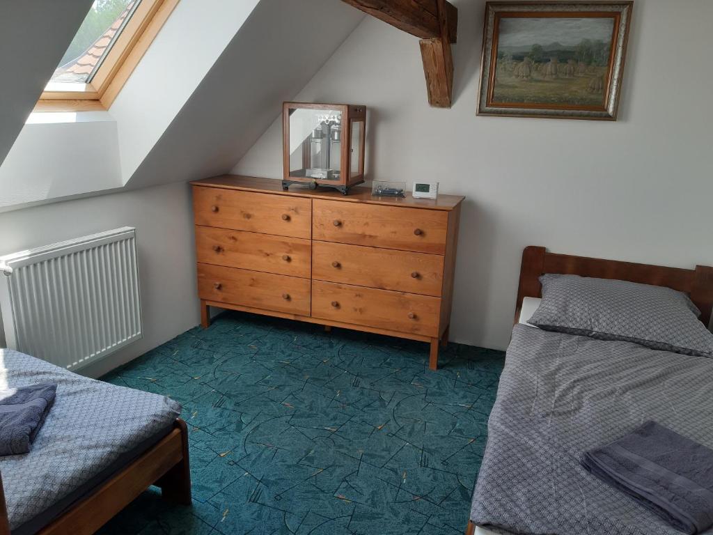 Postel nebo postele na pokoji v ubytování Apartmán Na Kamenu