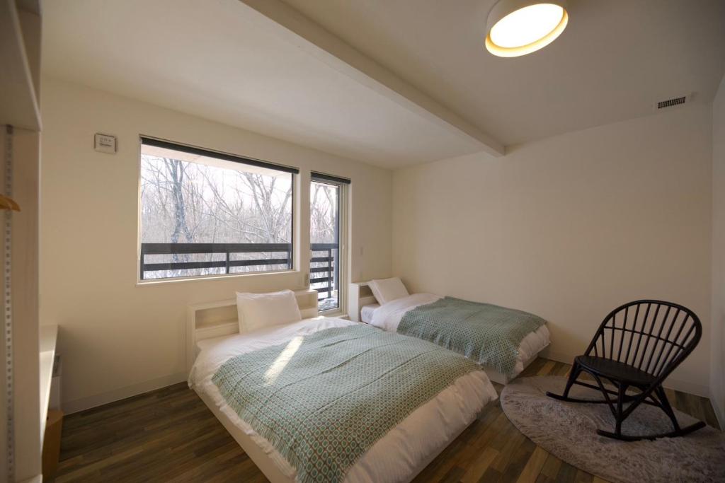 Postel nebo postele na pokoji v ubytování HOTEL BOTH