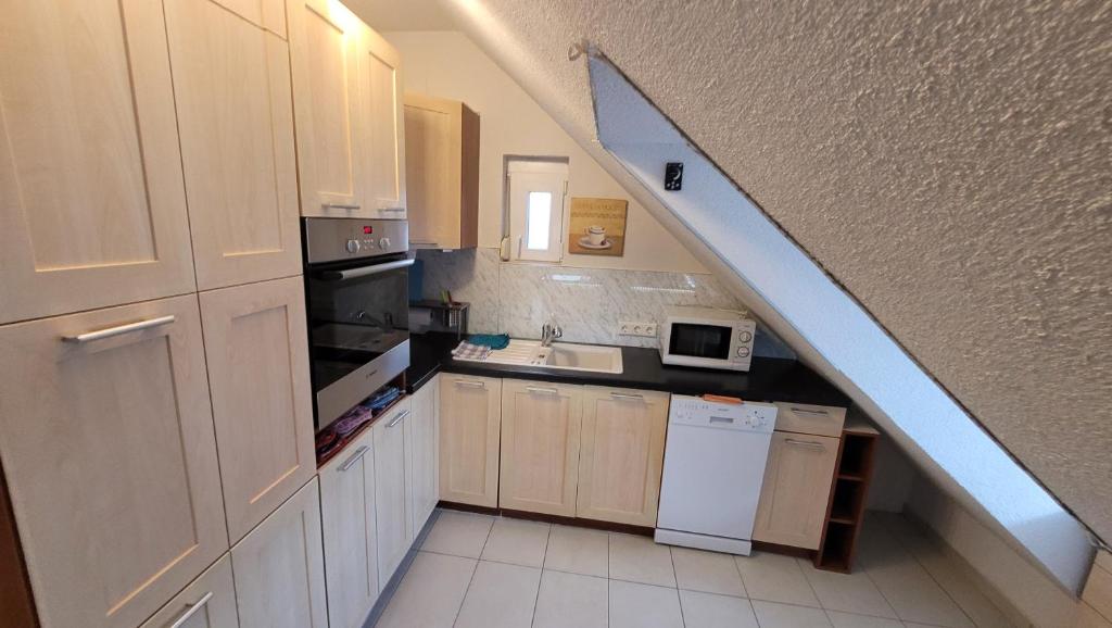Kuchyň nebo kuchyňský kout v ubytování Napfény Ház Sonnenschein Haus