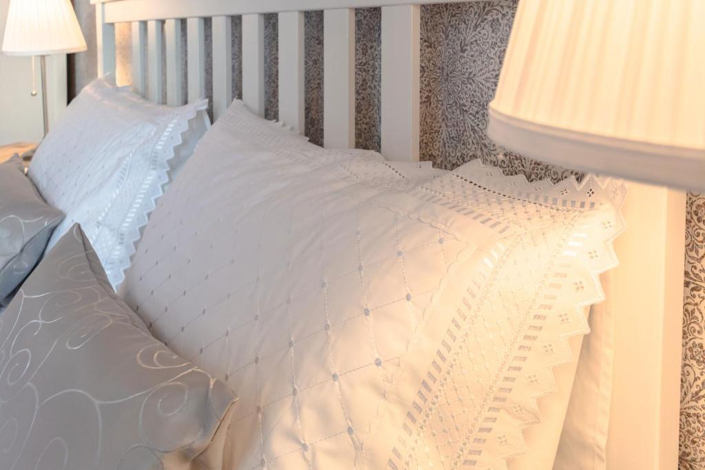 Postel nebo postele na pokoji v ubytování Hotel Villa Wahnfried Thiessow
