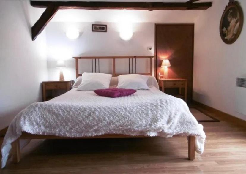 Ein Bett oder Betten in einem Zimmer der Unterkunft Belle de jour