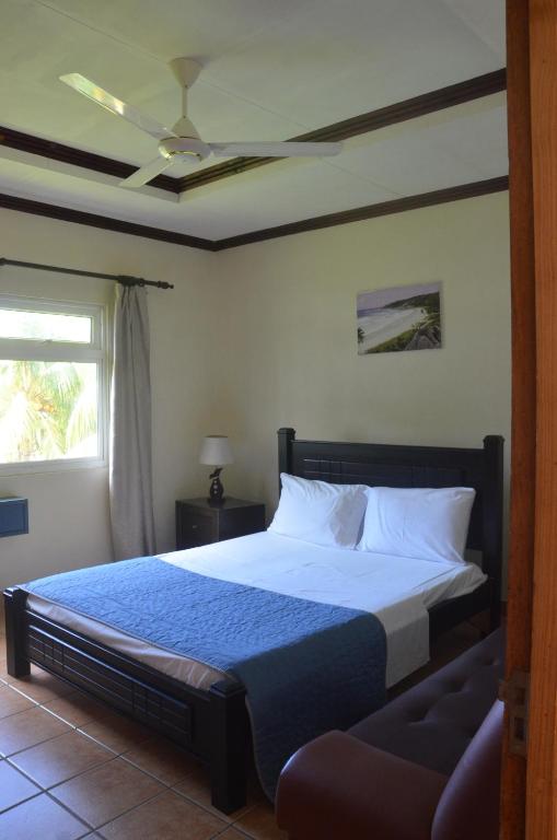 Postel nebo postele na pokoji v ubytování Butterfly Villas