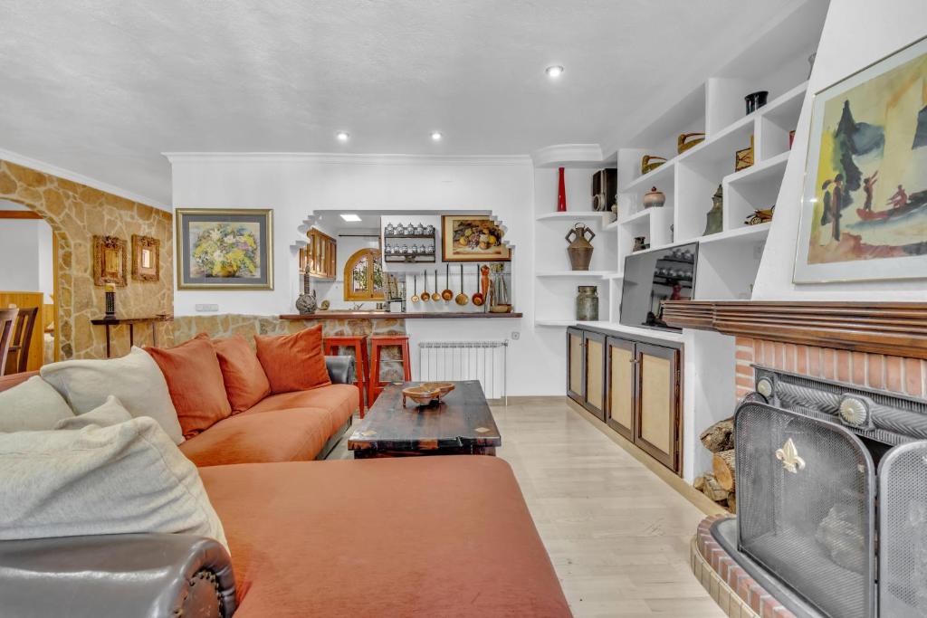 Część wypoczynkowa w obiekcie Casa temática Andaluza con vistas al valle - El Mirador de Benahavis