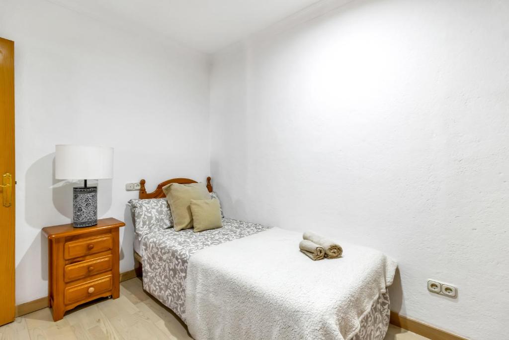 Łóżko lub łóżka w pokoju w obiekcie Casa temática Andaluza con vistas al valle - El Mirador de Benahavis