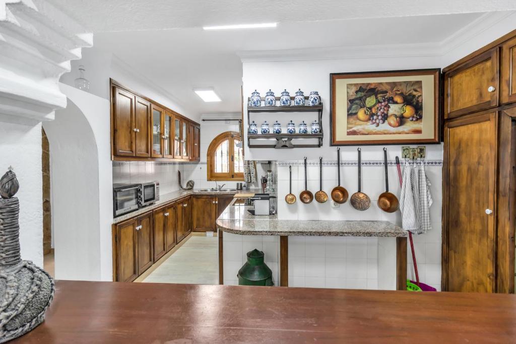Kuchnia lub aneks kuchenny w obiekcie Casa temática Andaluza con vistas al valle - El Mirador de Benahavis