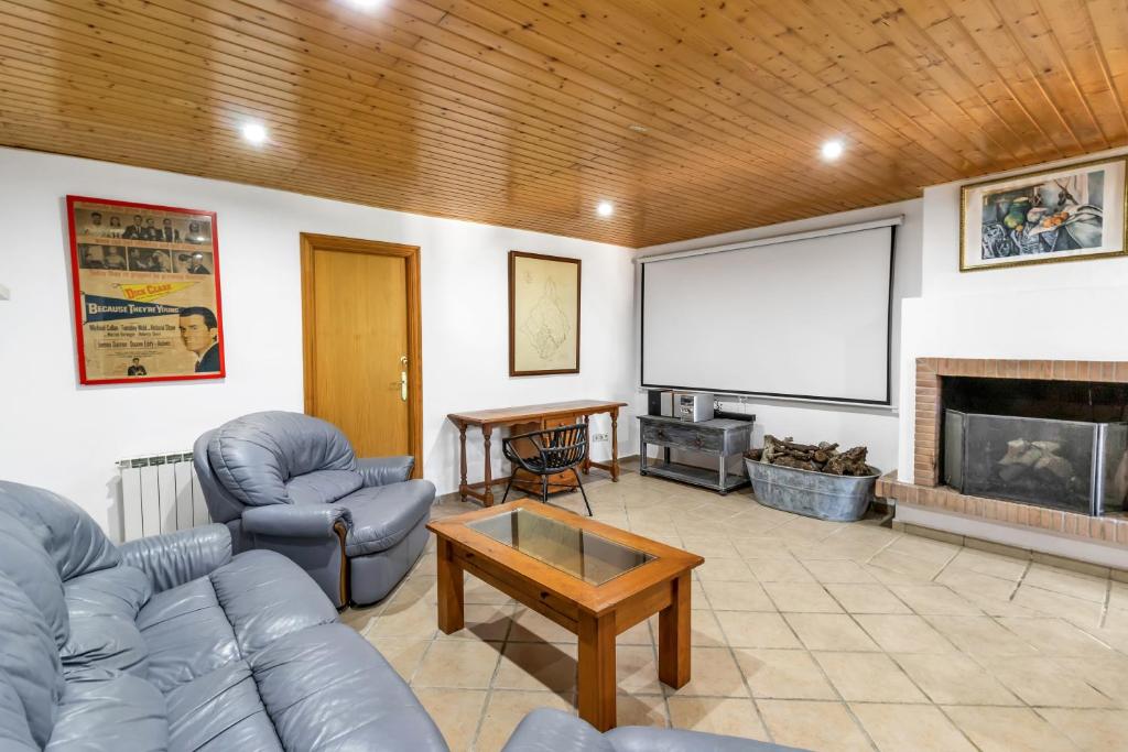 Część wypoczynkowa w obiekcie Casa temática Andaluza con vistas al valle - El Mirador de Benahavis