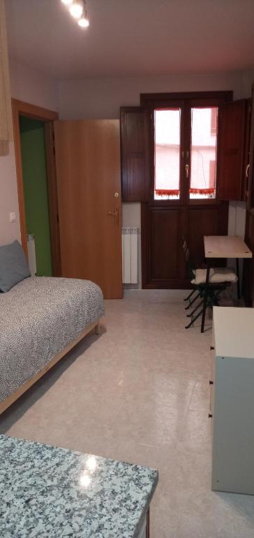 A bed or beds in a room at Coqueto Estudio 1