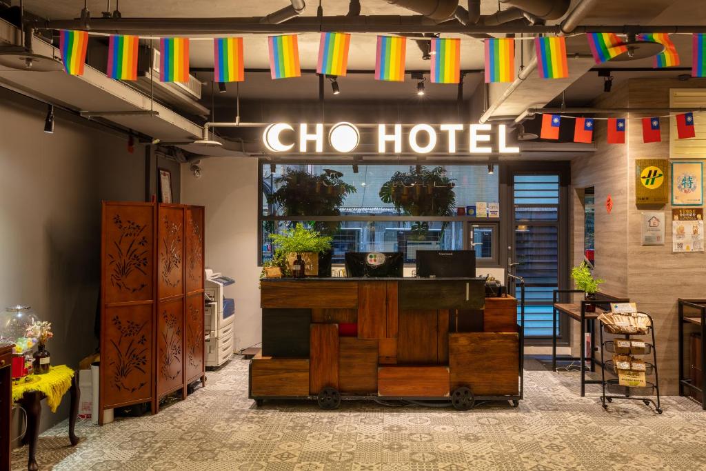 a cho hotel with a sign in a room at Cho Hotel 3 in Taipei