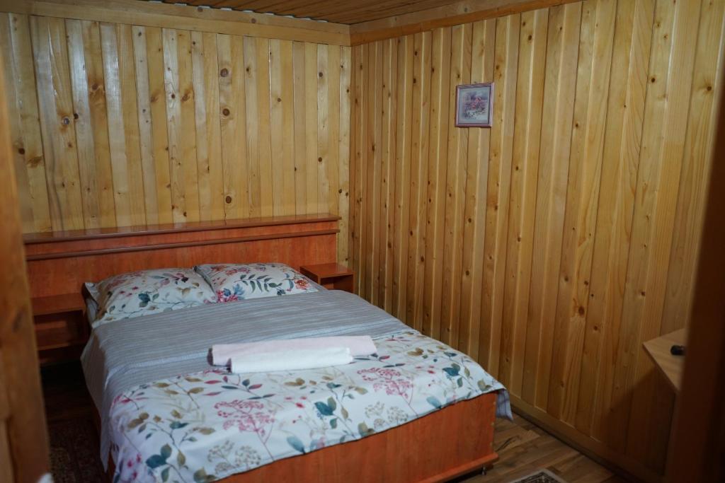 Postel nebo postele na pokoji v ubytování Cabana Suprema Armonie