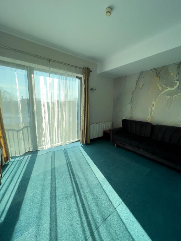 Postel nebo postele na pokoji v ubytování Hotel Poleski