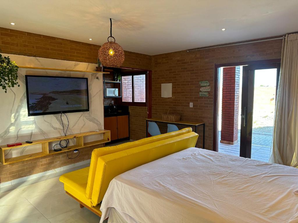 Μια τηλεόραση ή/και κέντρο ψυχαγωγίας στο Bem te quero pipa- Chalé Térreo