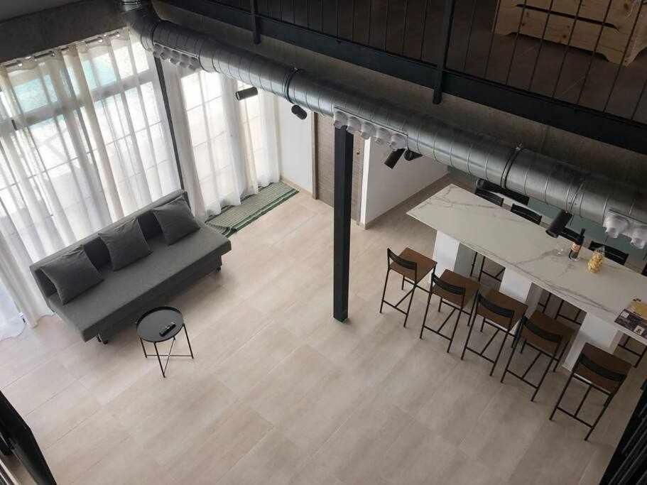 Posezení v ubytování Alojamiento El Pez Casa con piscina climatizada