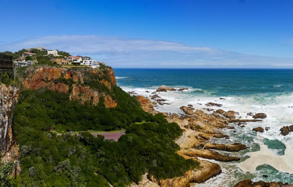a house on top of a mountain overlooking the ocean at Villa Seaview in Knysna