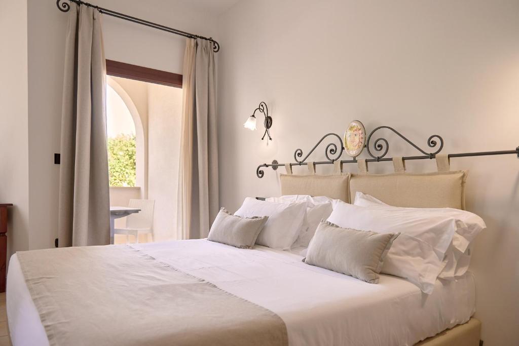 Postel nebo postele na pokoji v ubytování Hotel Montecallini - Adult Only 14
