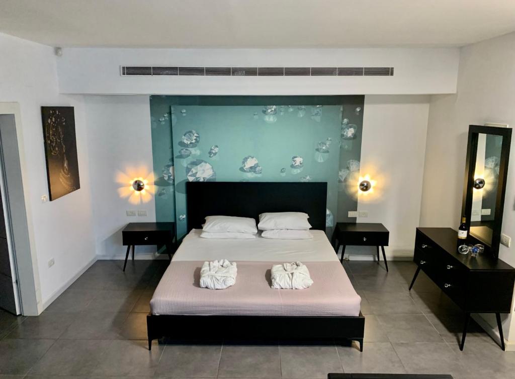 Postel nebo postele na pokoji v ubytování Diamond Mansion-Suite B