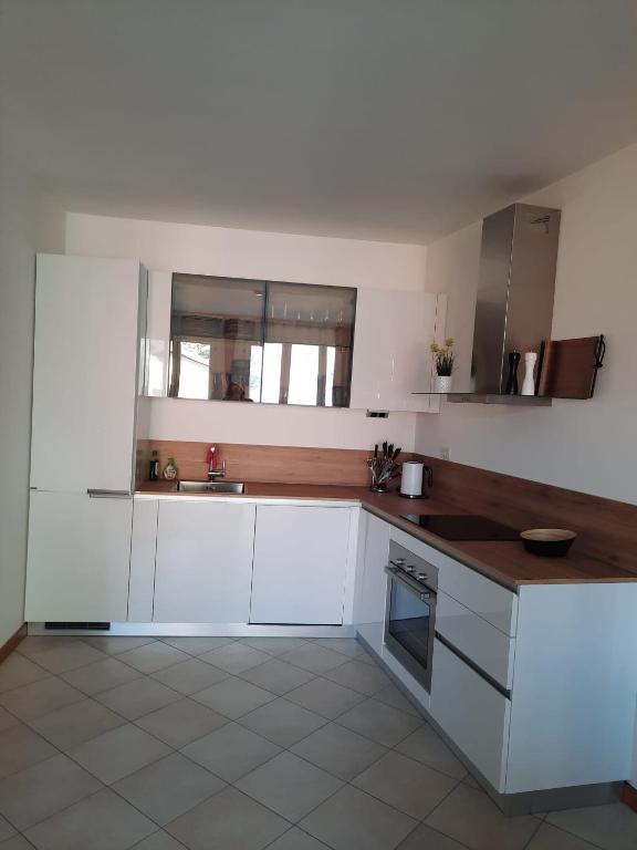 A kitchen or kitchenette at Fantastic Lake Como apartment