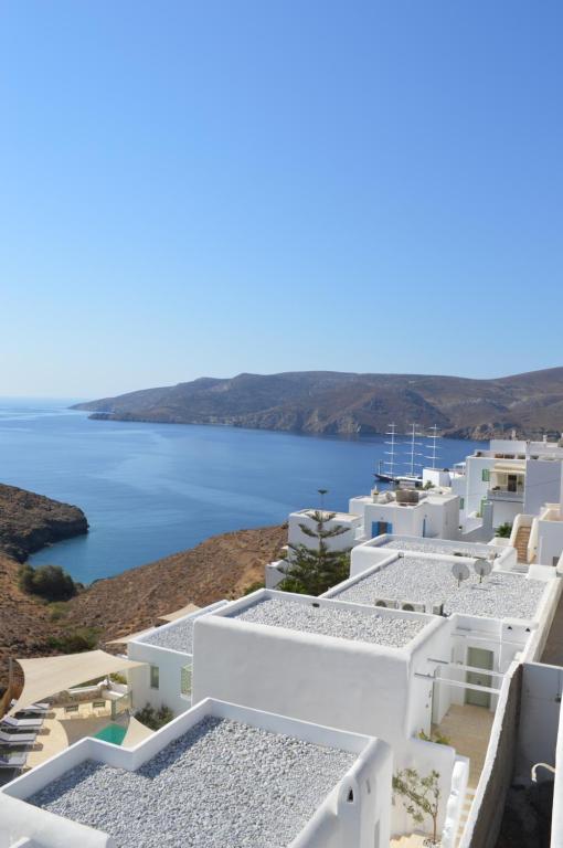 a view of white buildings and the ocean at Pylaia Boutique Hotel & Spa in Astypalaia Town