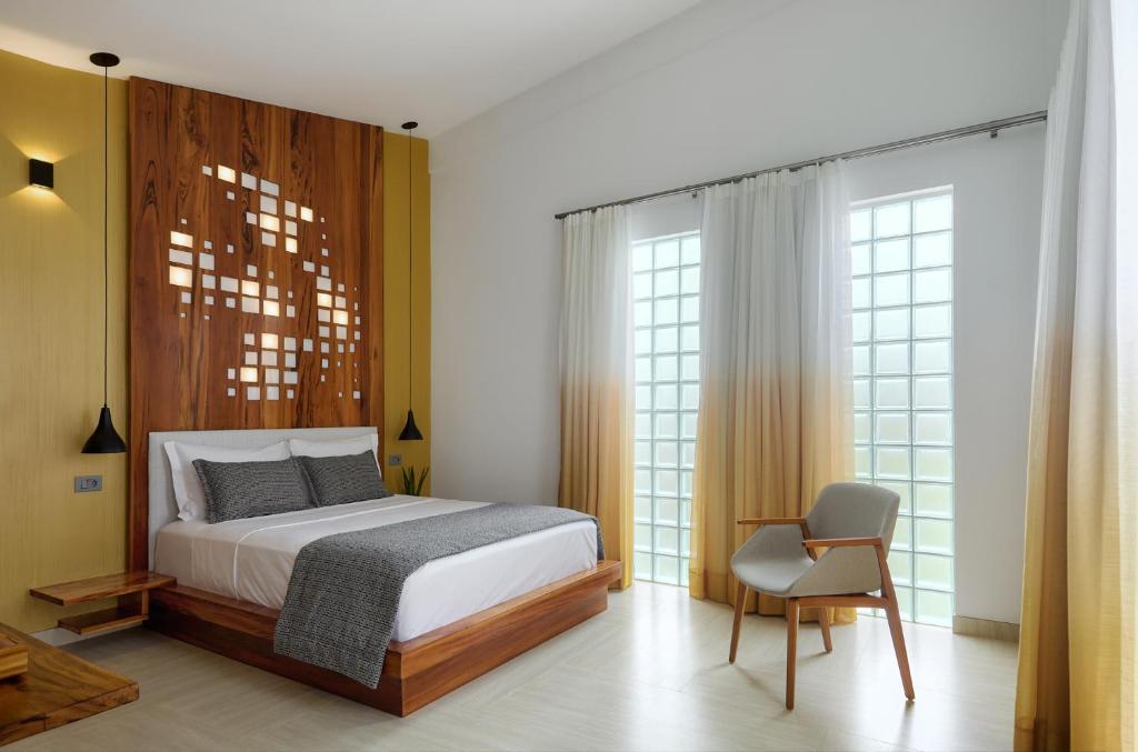 Postel nebo postele na pokoji v ubytování Villa Nautica Boutique Hotel