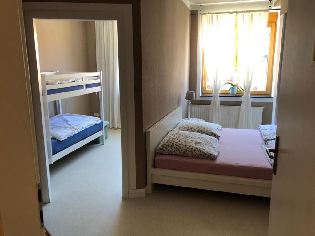 Postel nebo postele na pokoji v ubytování Gästehaus Moin Allgäu