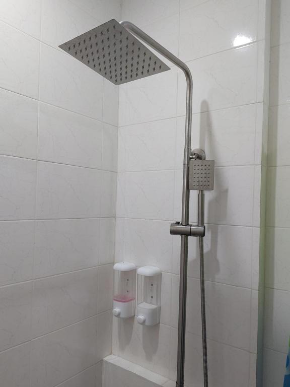Koupelna v ubytování Apartelle near Philippine Arena