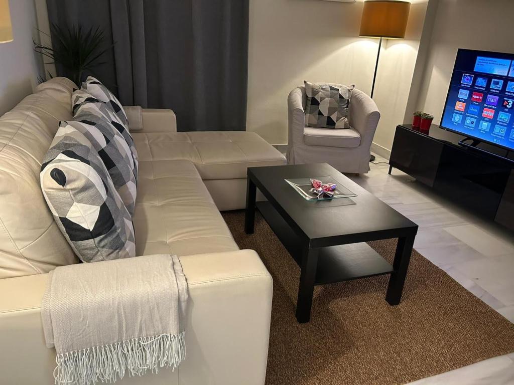 Posezení v ubytování Apartamento Fibes-Congresos Parking Gratis