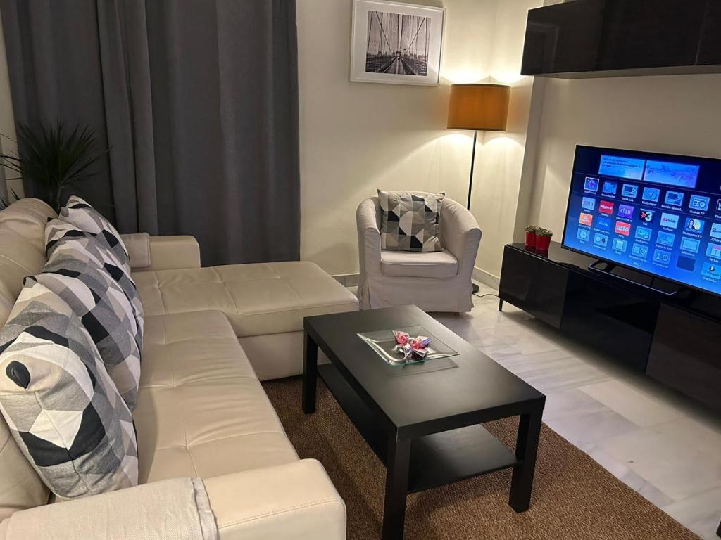 Posezení v ubytování Apartamento Fibes-Congresos Parking Gratis