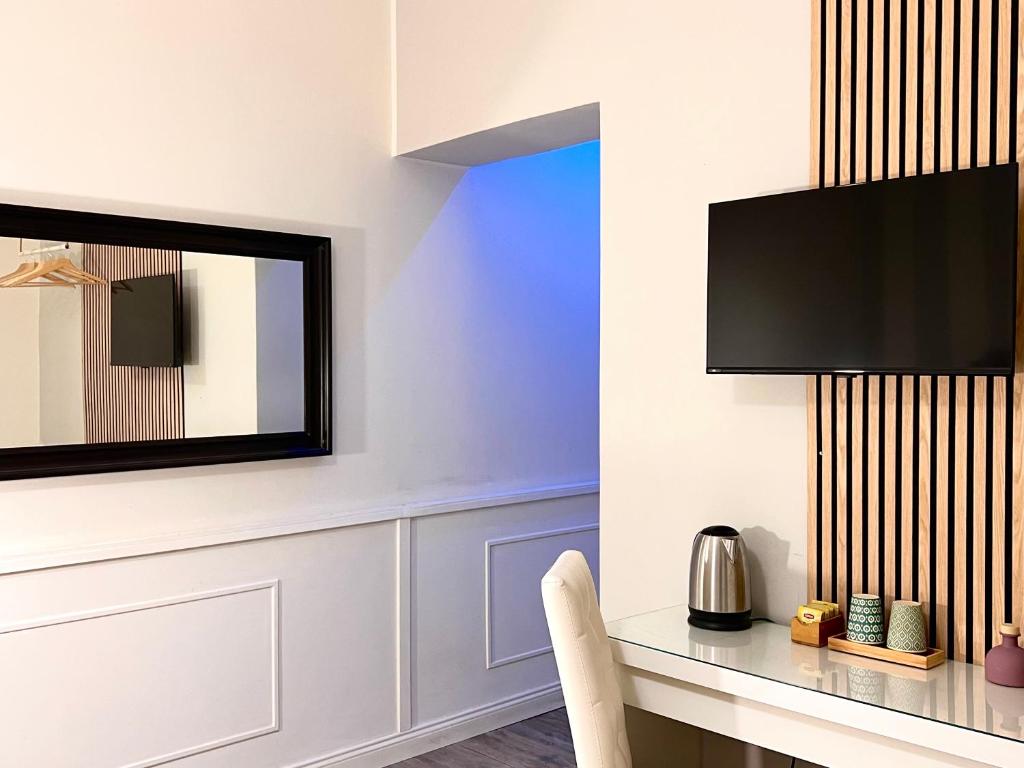Telewizja i/lub zestaw kina domowego w obiekcie Villa di Nera B&B