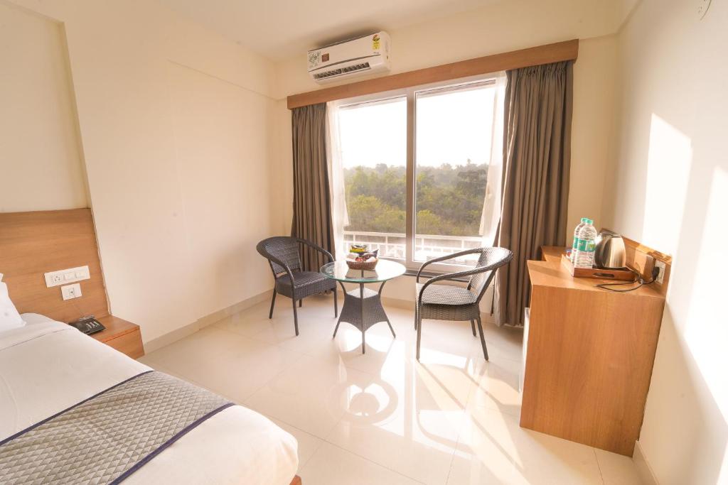 Postel nebo postele na pokoji v ubytování Hotel Wayfarer