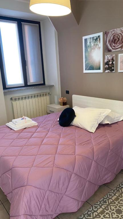 Łóżko lub łóżka w pokoju w obiekcie Corte 22 B&b e Appartamenti