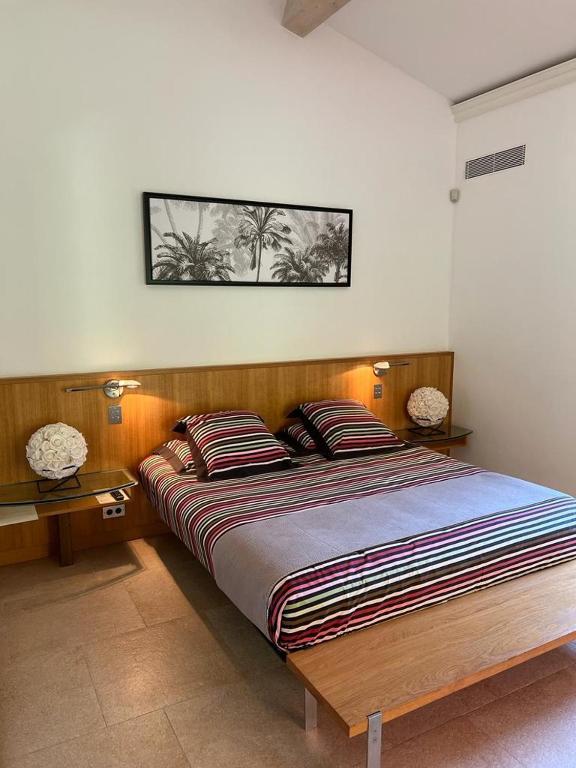 Postel nebo postele na pokoji v ubytování BASTIDE DE RAMATUELLE