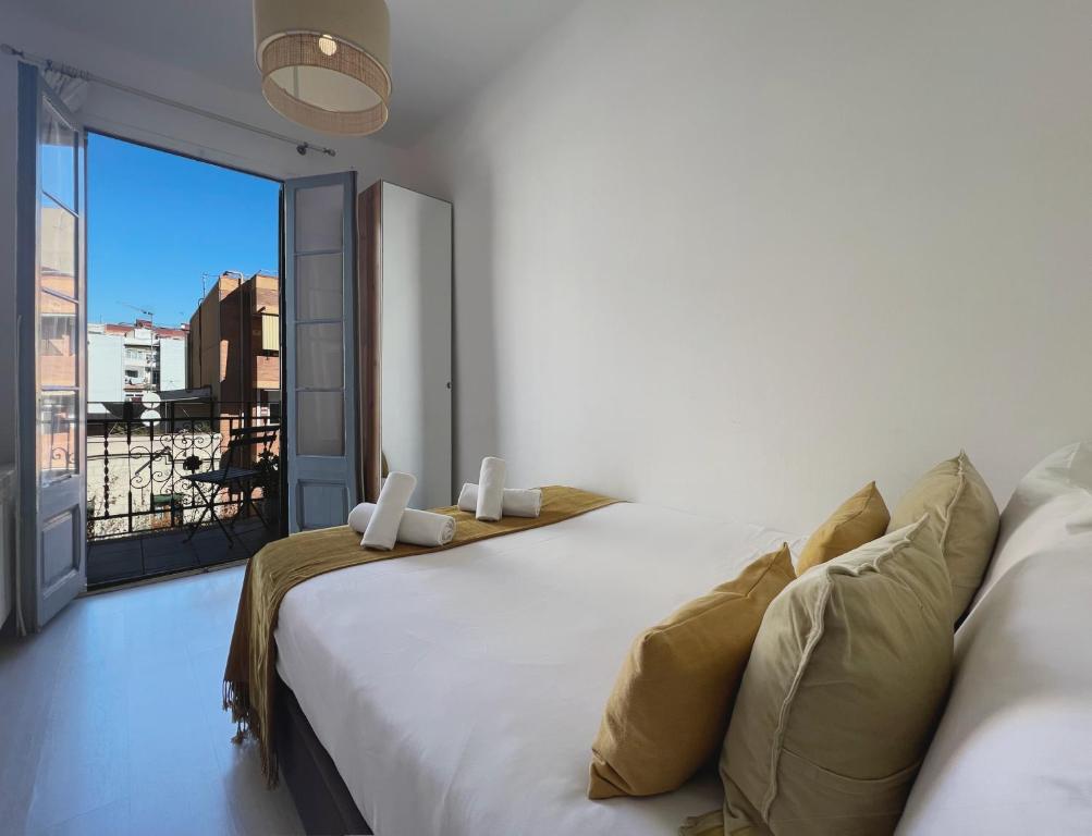 Postel nebo postele na pokoji v ubytování Stay U-nique Apartments Lepant