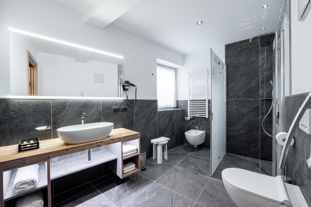 Koupelna v ubytování Albergo Garni Edy (B&B)