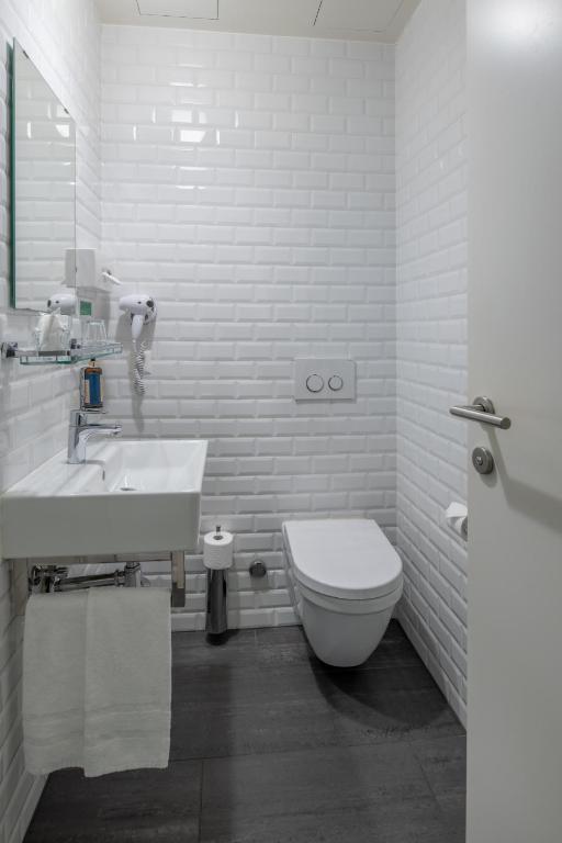 Koupelna v ubytování Hôtel Pax