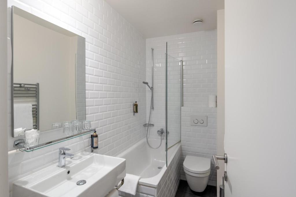 Koupelna v ubytování Hôtel Pax