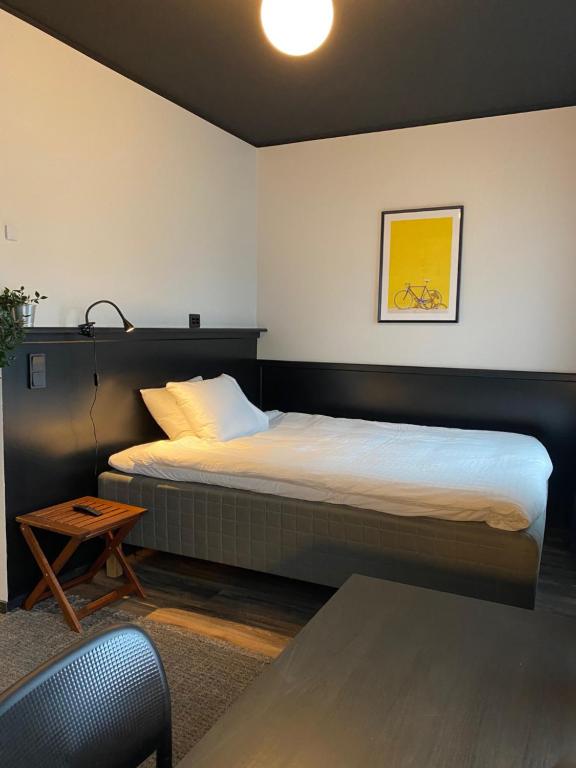 Postel nebo postele na pokoji v ubytování Magnolia House Sollentuna