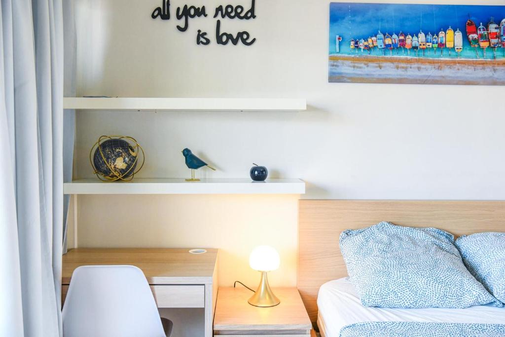 Posteľ alebo postele v izbe v ubytovaní Grand appartement avec balcon et parking