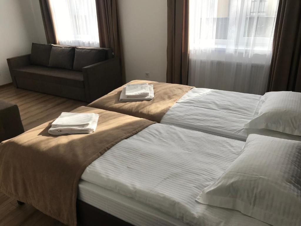 Postel nebo postele na pokoji v ubytování Leo Rooms