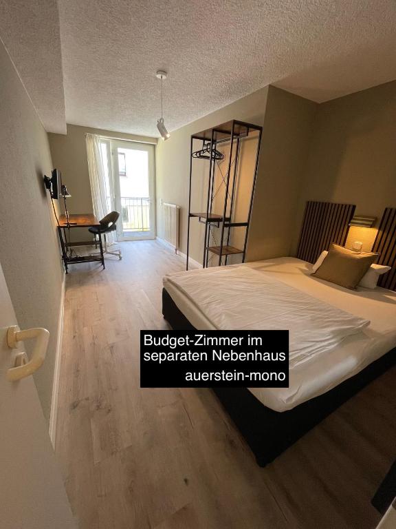 Postel nebo postele na pokoji v ubytování AUERSTEIN-Hotels auerstein & auerstein-mono