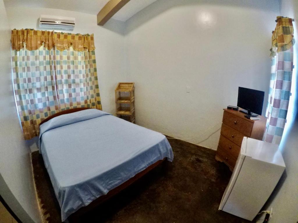 Postel nebo postele na pokoji v ubytování La Pintada Inn