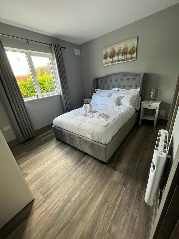 Postel nebo postele na pokoji v ubytování Horseleap BNB