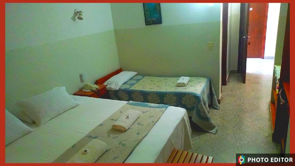Postel nebo postele na pokoji v ubytování Das Heim Hotel